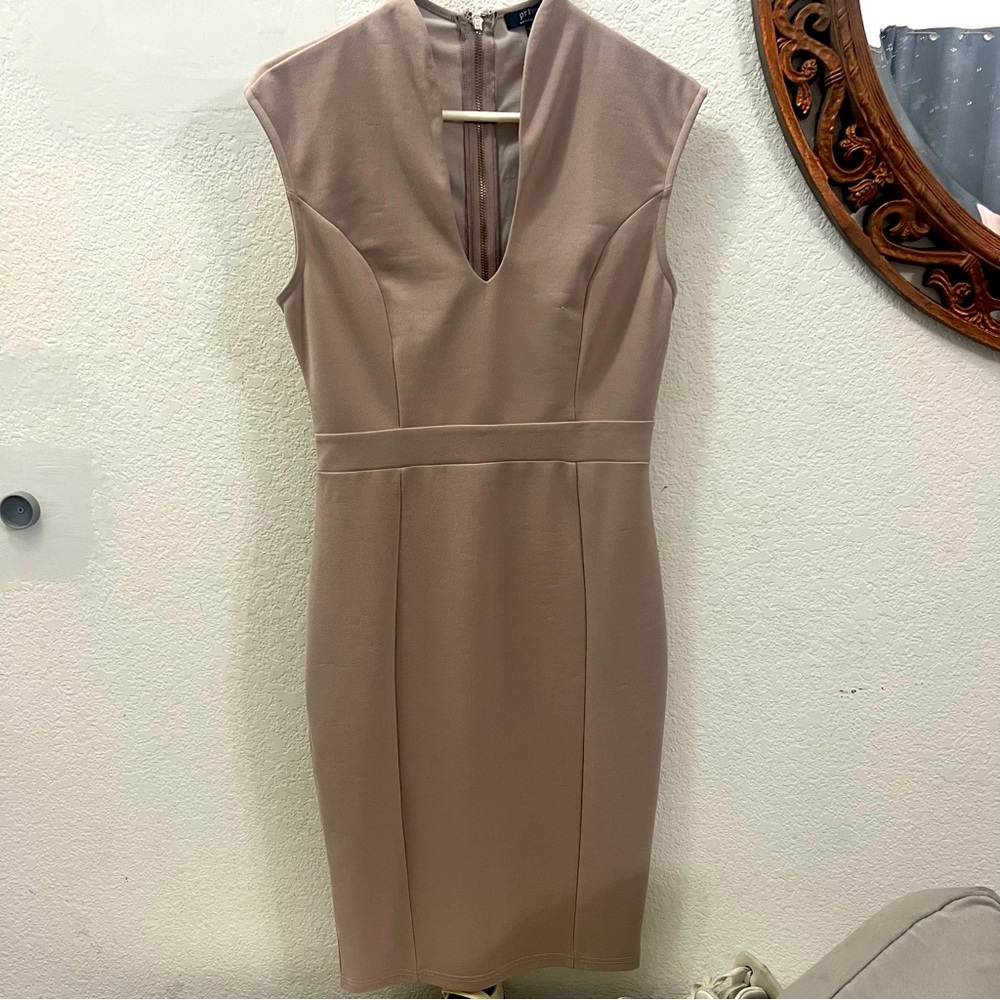 Worn once. Nude dress. Midi length